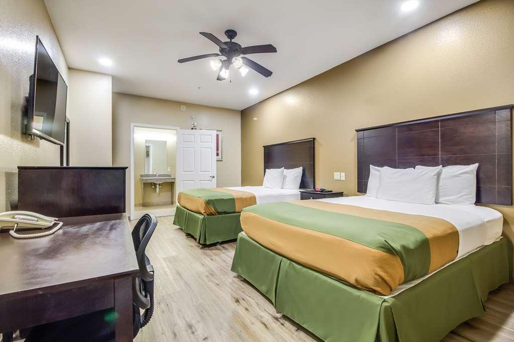 Americas Best Value Inn & Suites Томбол Стая снимка