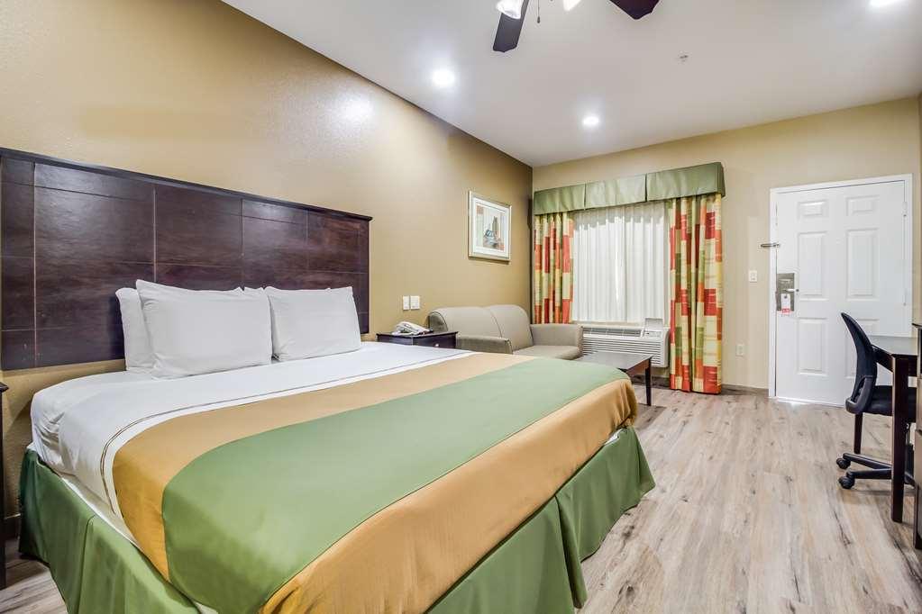 Americas Best Value Inn & Suites Томбол Стая снимка